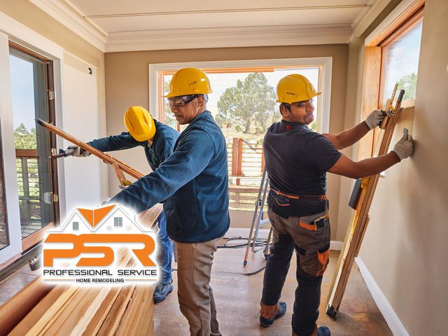 three male technicians professionals working performing home remodeling services inside interior of home