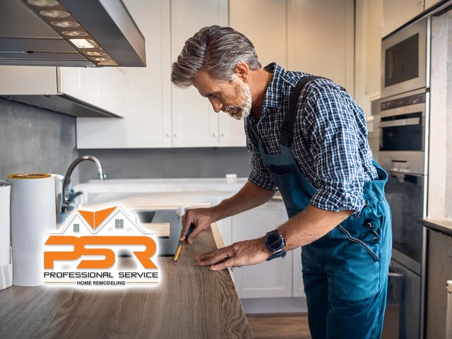 male technician professional working performing expert interior home remodeling in kitchen